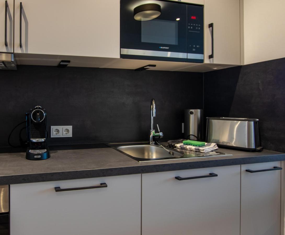 Livin63 Studio Apartments Hoesbach Luaran gambar