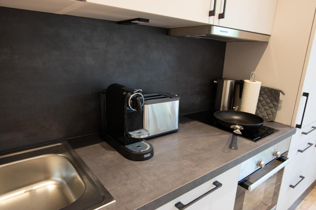 Livin63 Studio Apartments Hoesbach Luaran gambar