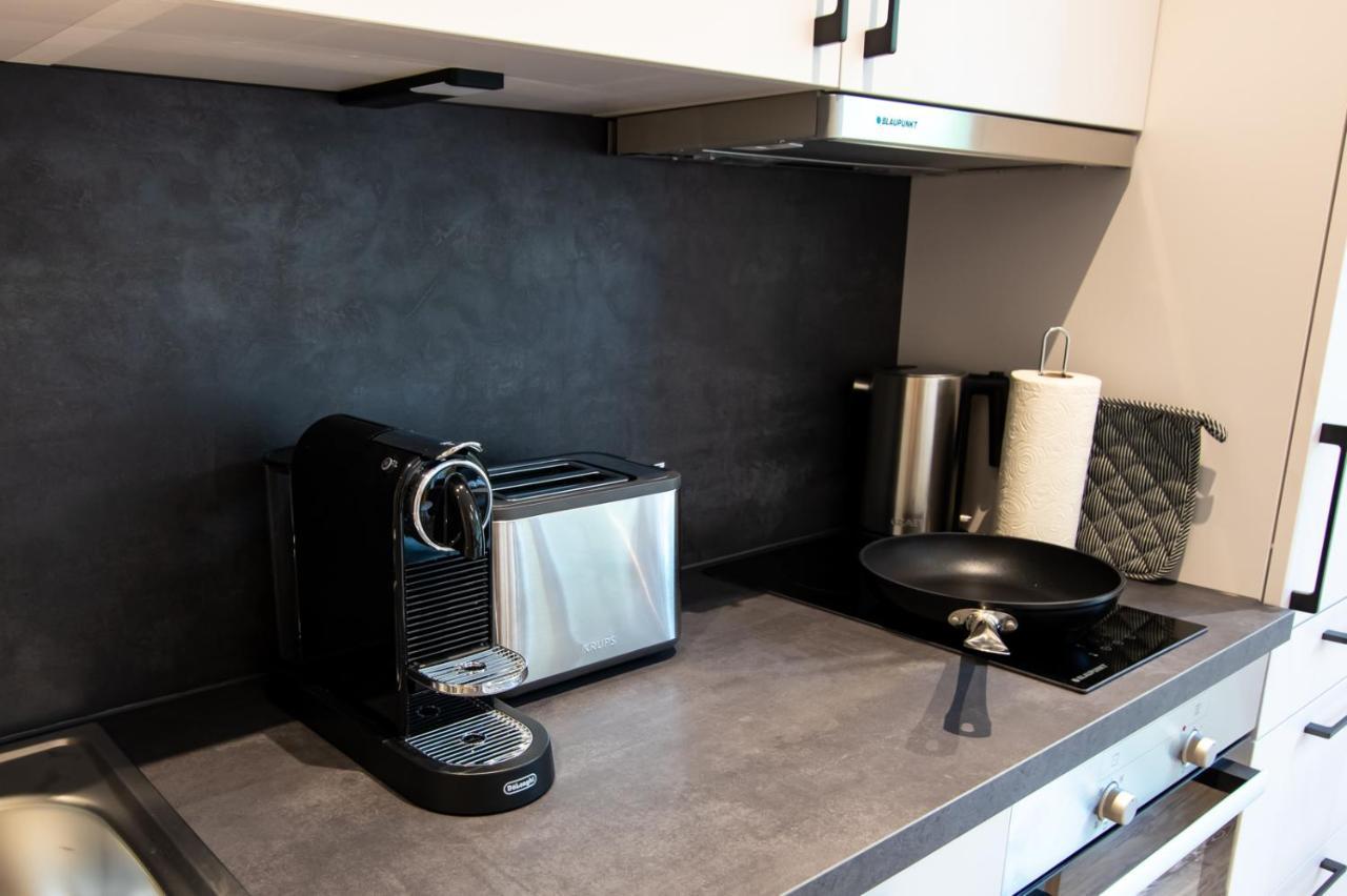 Livin63 Studio Apartments Hoesbach Luaran gambar